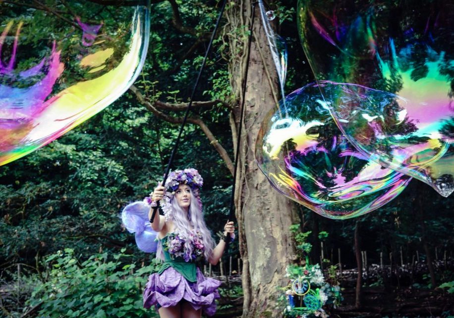 Magical bubble artists for hire UK and worldwide. Fairyt themed bubbleologists and bubble magicians.